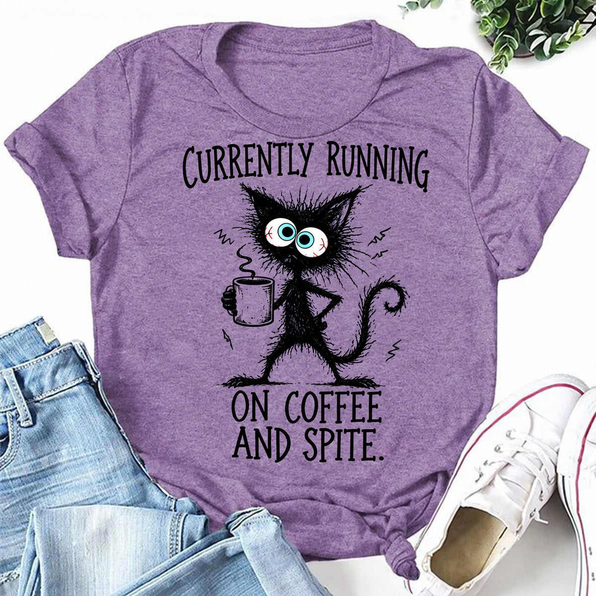 Purple women's T-shirt with Currently Running On Coffee And Spite graphic
