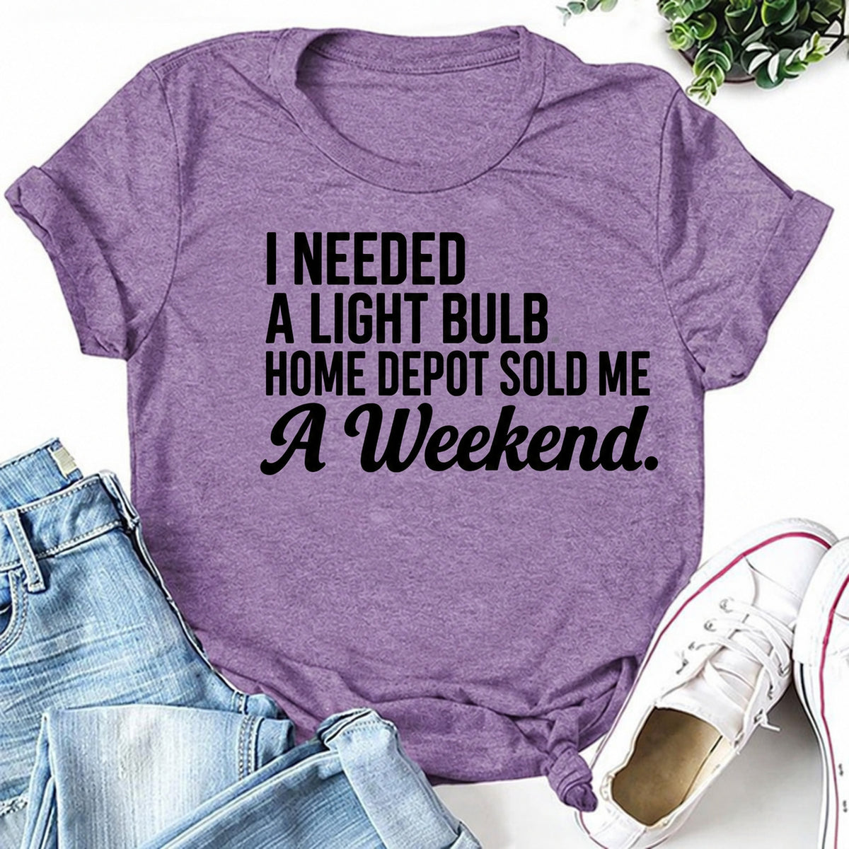 Purple women's T-shirt with I Needed A Light Bulb. Home Depot Sold Me A Weekend graphic