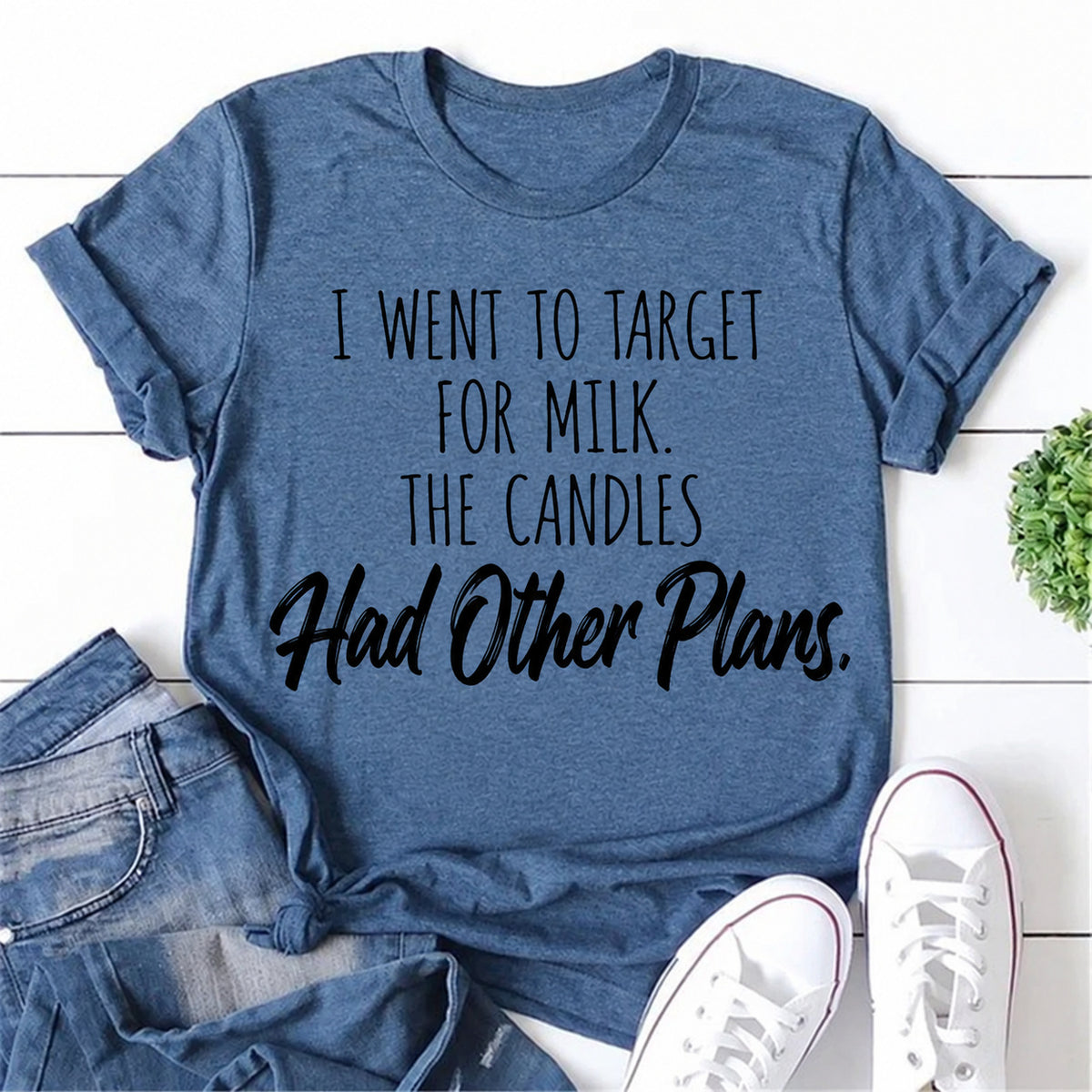 Blue women's T-shirt with I Went To Target For Milk. The Candles Had Other Plans graphic