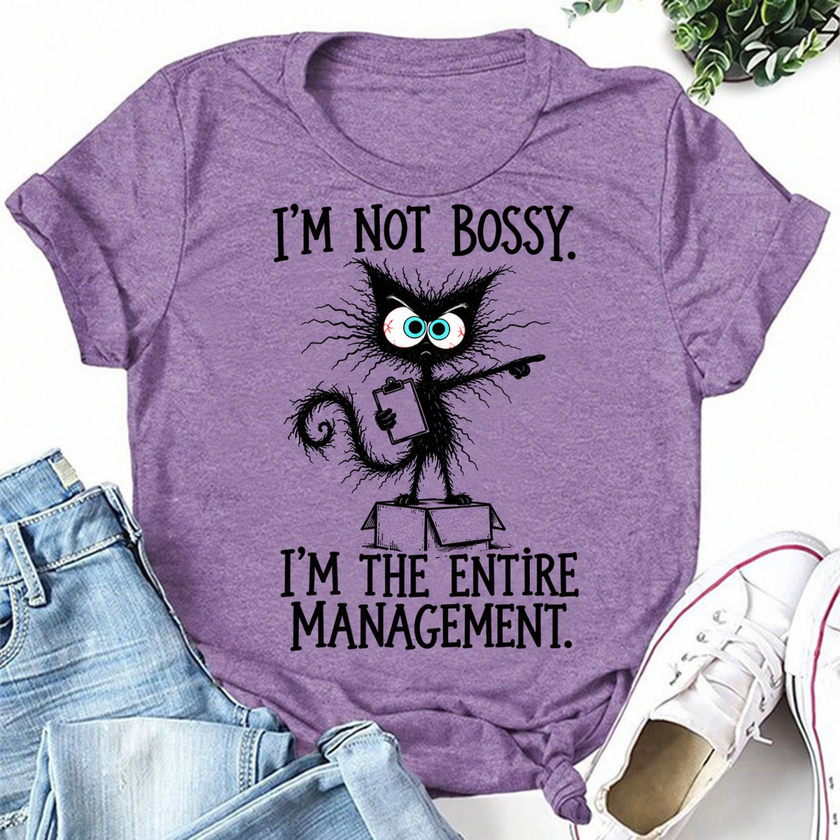 Purple women's T-shirt with I'm Not Bossy. I'm The Entire Management graphic