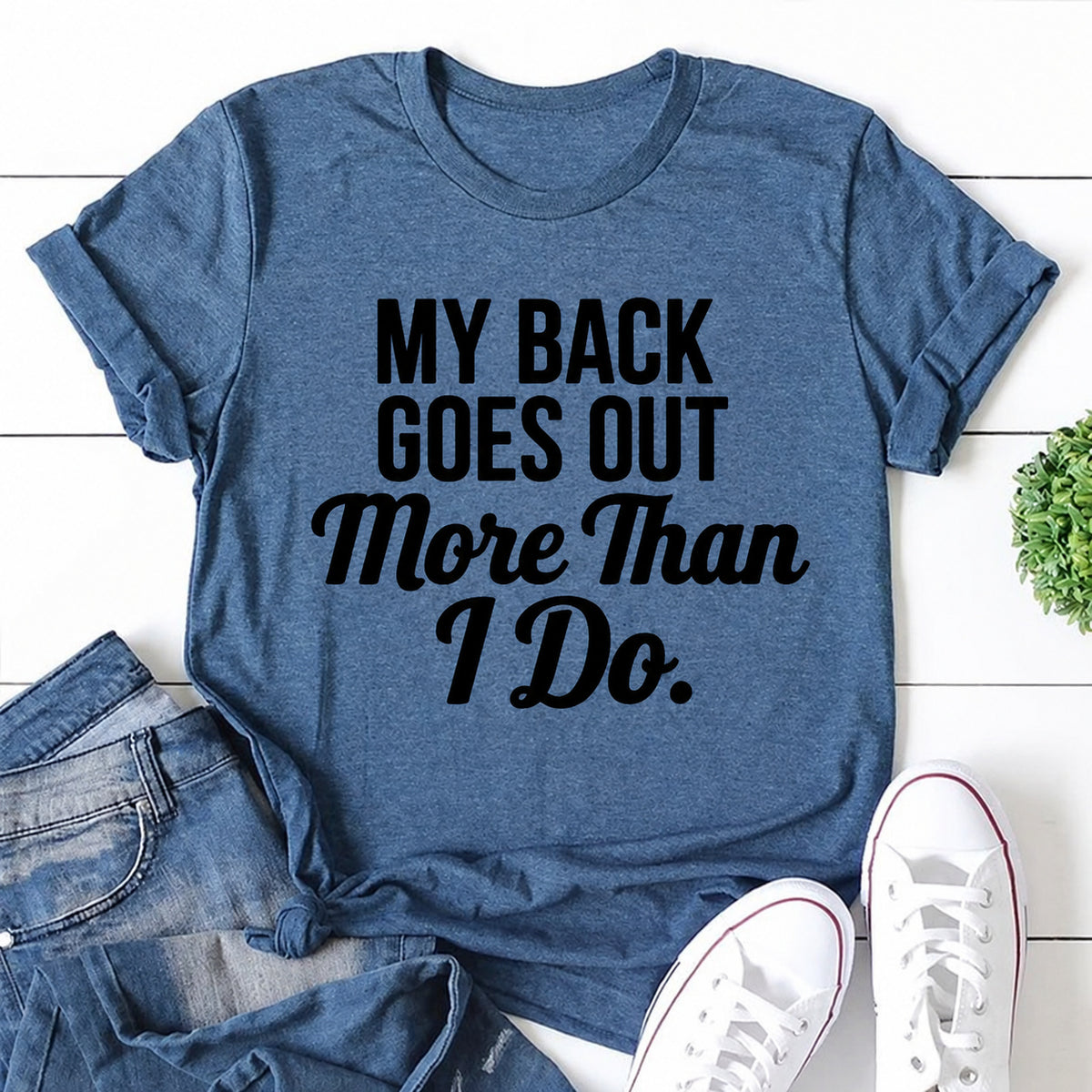 Blue women's T-shirt with My Back Goes Out More Than I Do graphic