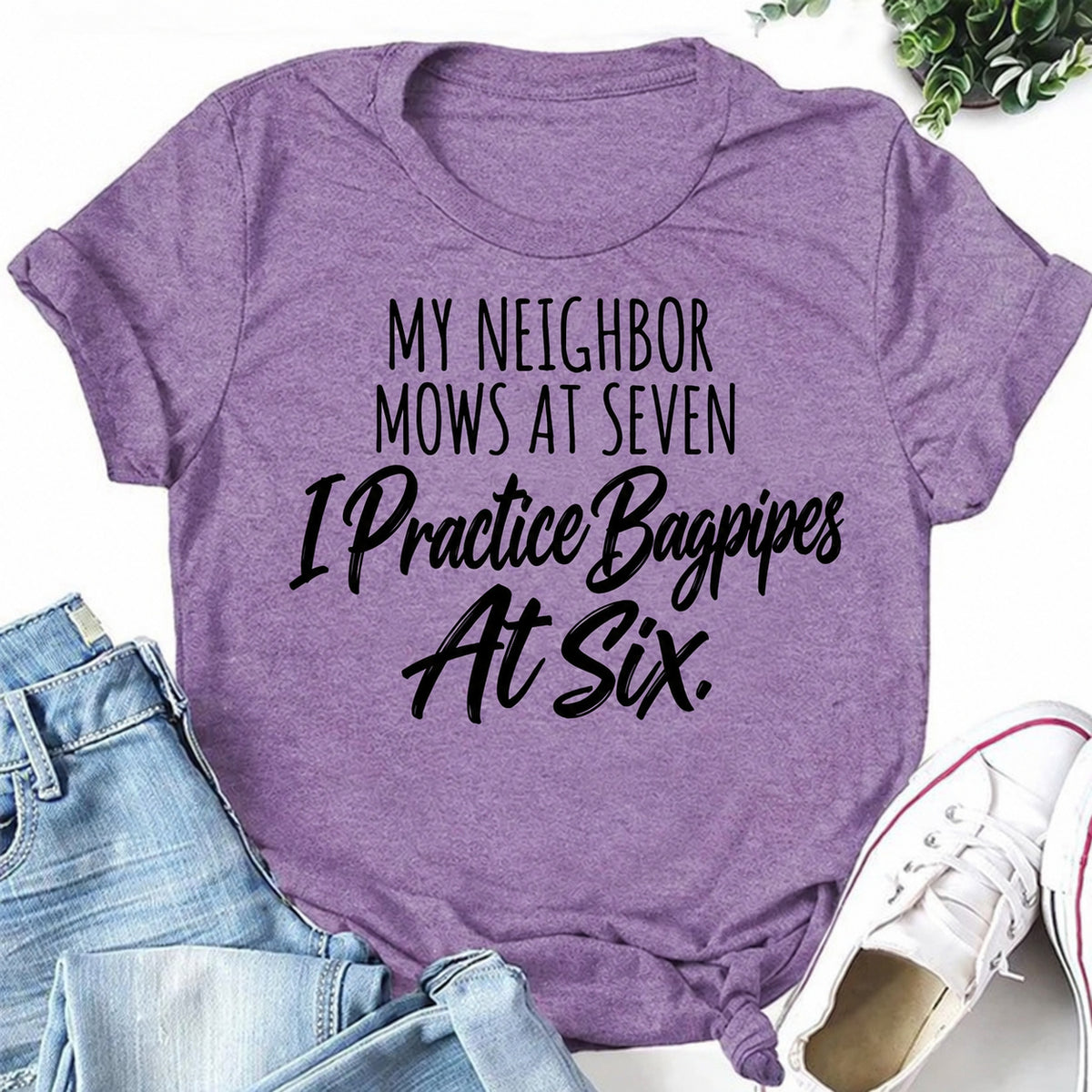 Purple women's T-shirt with My Neighbor Mows At Seven. I Practice Bagpipes At Six graphic