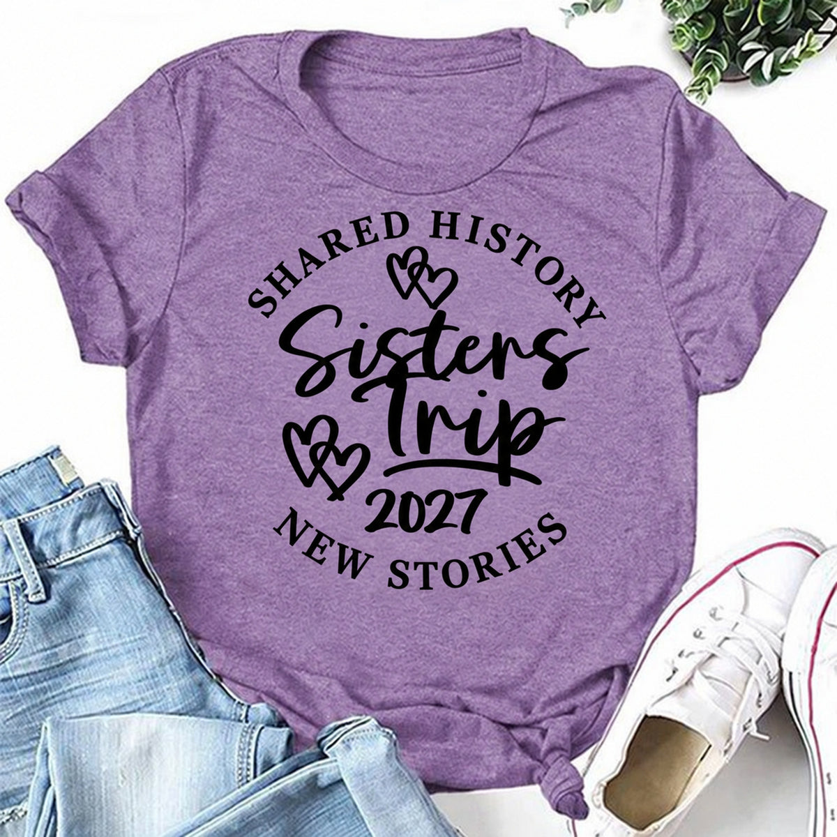 Purple women's T-shirt with Shared History • Sisters Trip • 2027 • New Stories graphic
