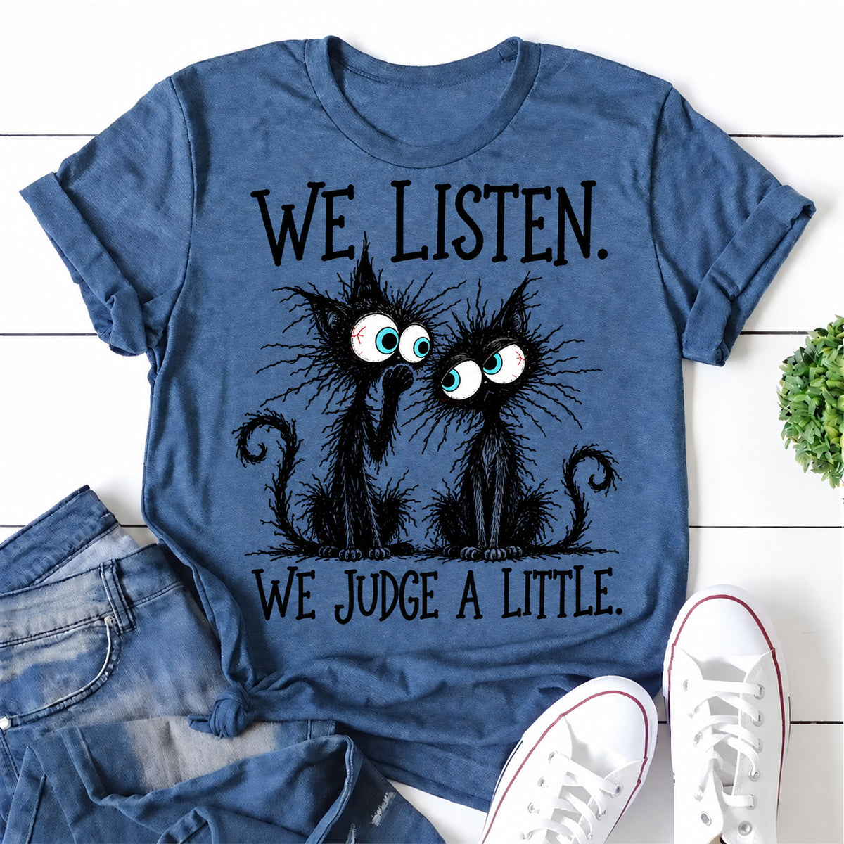 Blue women's T-shirt with We Listen. We Judge A Little graphic