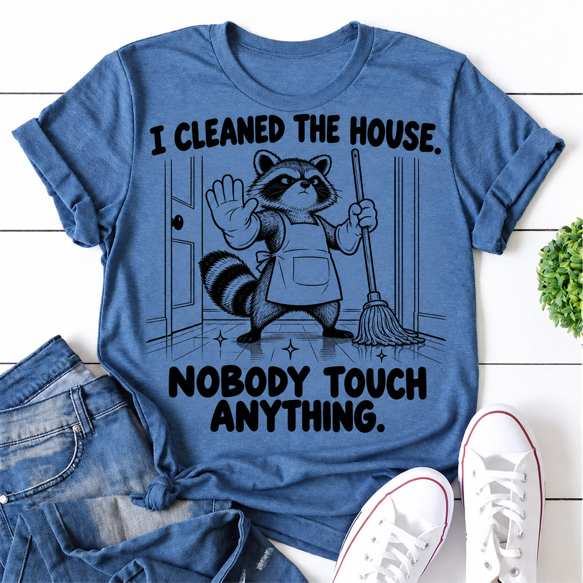 Blue women's T-shirt with I Cleaned The House. Nobody Touch Anything graphic