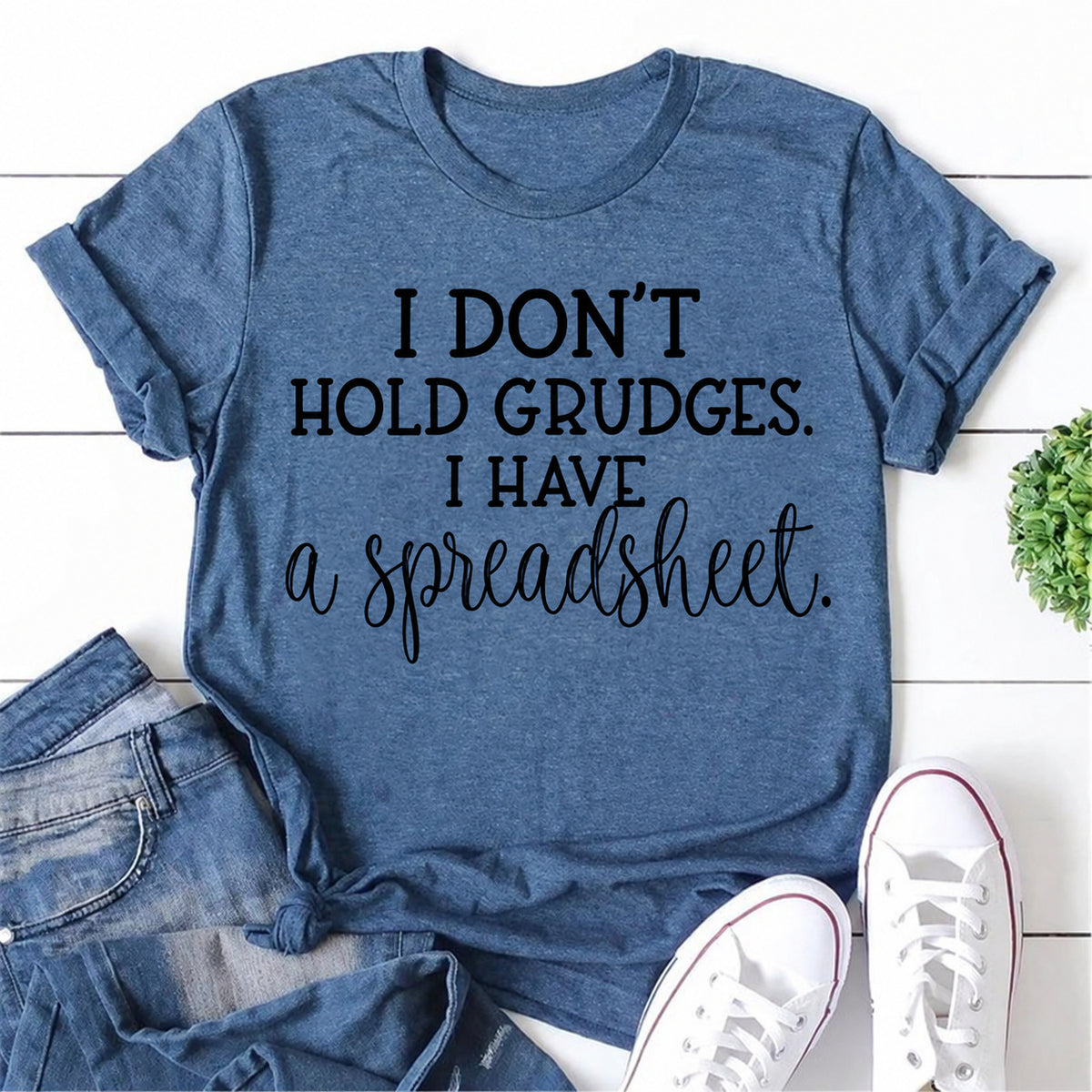 Blue women's T-shirt with I Don't Hold Grudges. I Have A Spreadsheet graphic