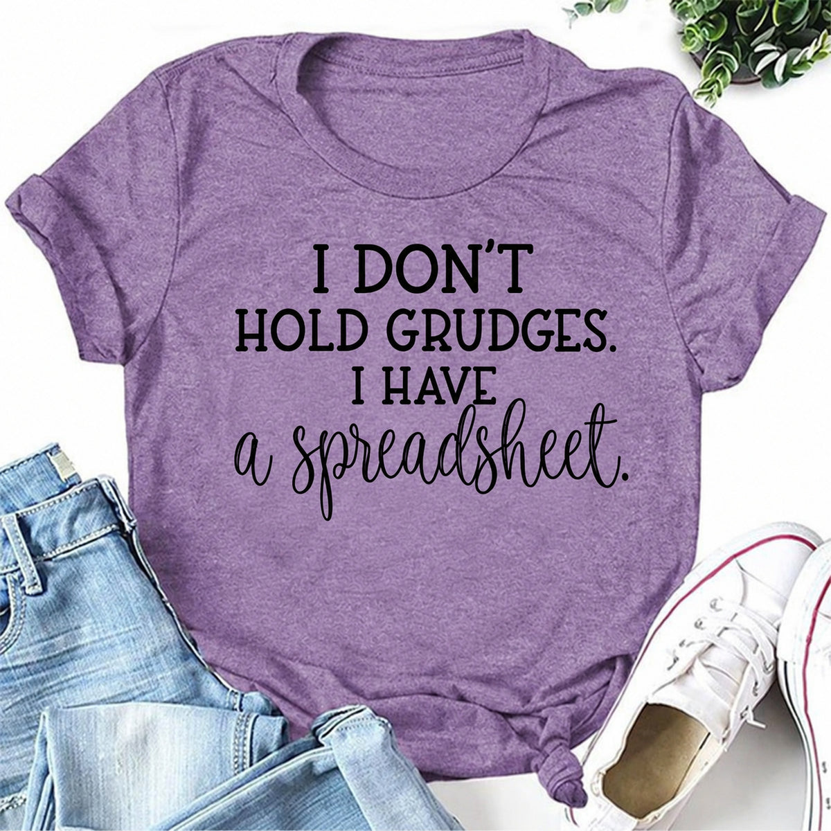 Purple women's T-shirt with I Don't Hold Grudges. I Have A Spreadsheet graphic