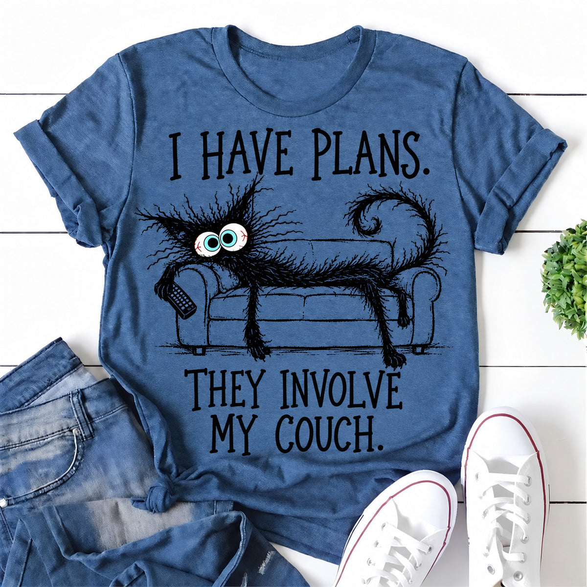 Blue women's T-shirt with I Have Plans. They Involve My Couch graphic