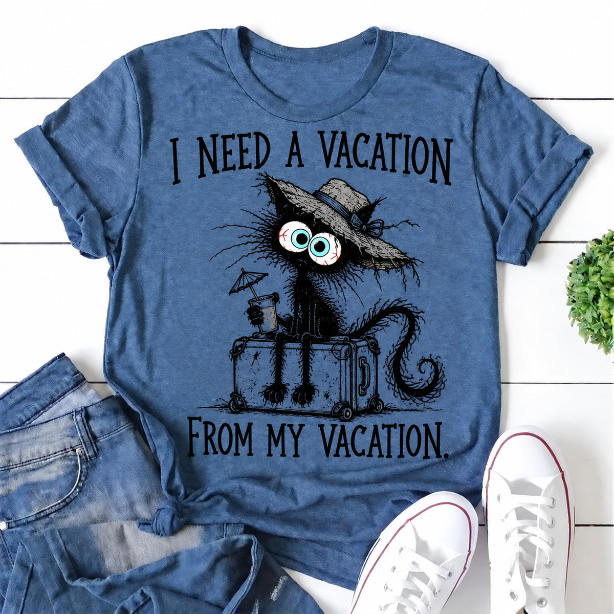 Blue women's T-shirt with I Need A Vacation From My Vacation graphic