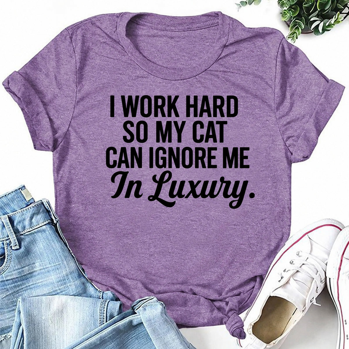 Purple women's T-shirt with I Work Hard So My Cat Can Ignore Me In Luxury graphic