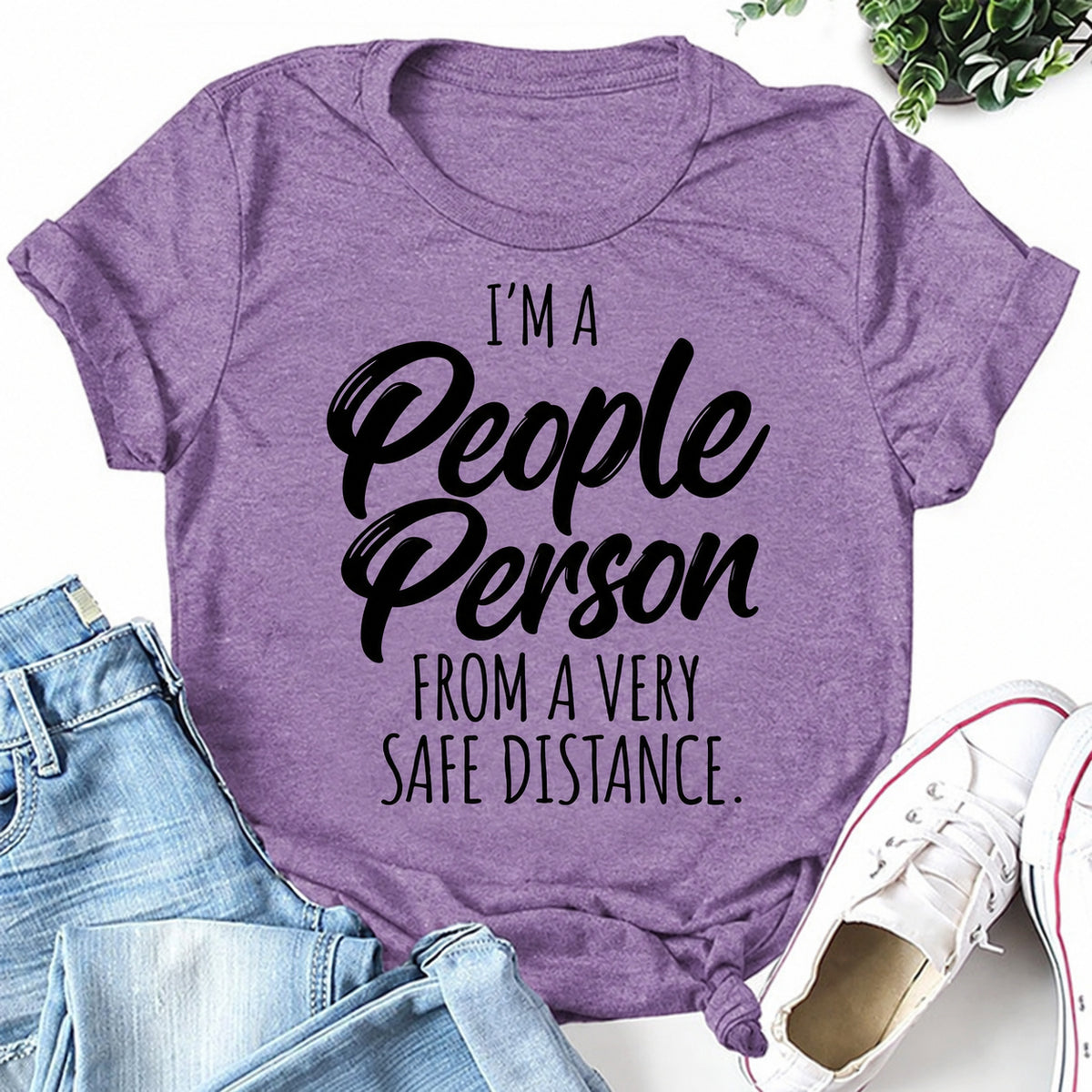 Purple women's T-shirt with I'm A People Person From A Very Safe Distance graphic