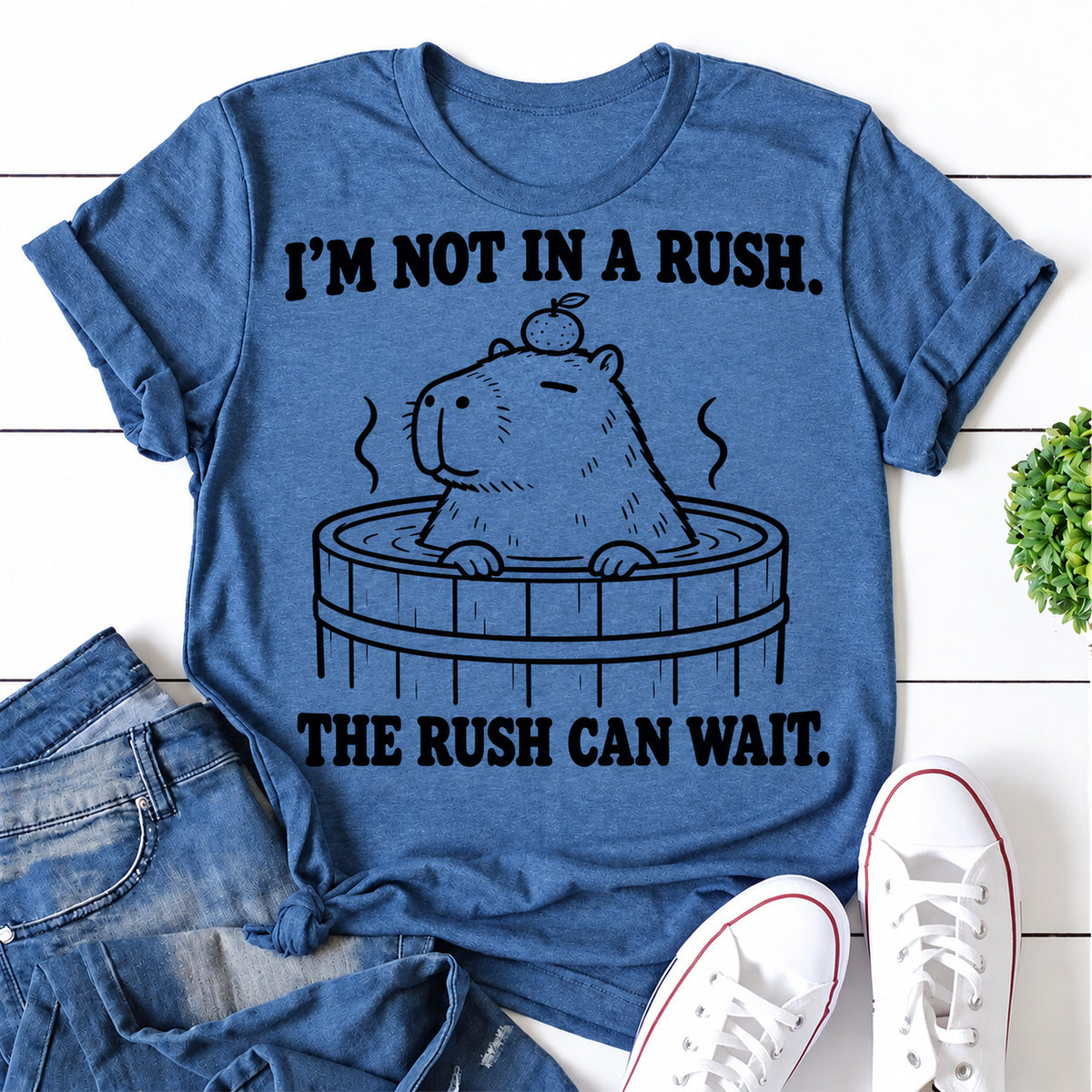 Blue women's T-shirt with I'm Not In A Rush. The Rush Can Wait graphic
